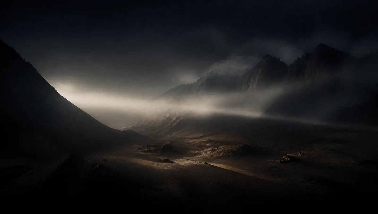 A beam of light travelling through a dark misty valley